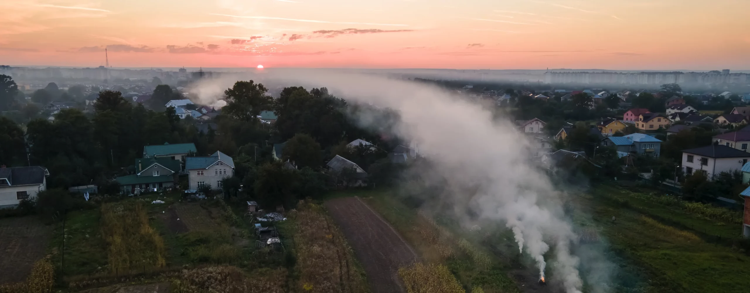 aerial view agricultural waste bonfires from dry grass straw stubble burning with thick smoke polluting air during dry season farmlands causing global warming carcinogen fumes