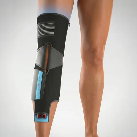 A close-up of a woman’s leg wearing a Game Ready articulated wrap for a knee injury.