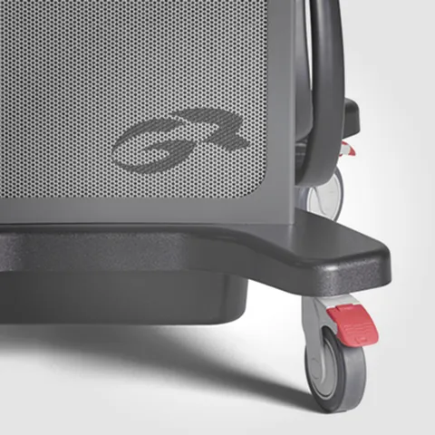 Close-up of a trolley, featuring a stylized logo.