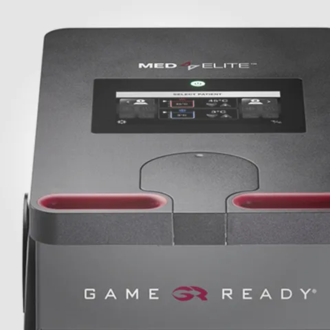 Close-up of a Game Ready Med4 Elite therapy device with a digital display and control panel on top.