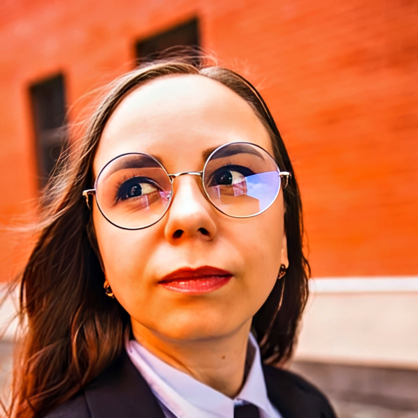 Lawyer headshot example: Young professional woman, real photo enhanced by AI