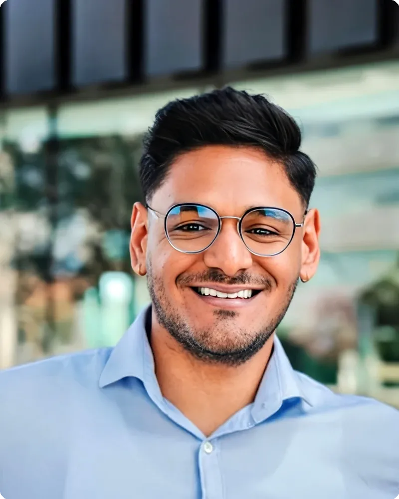 Retail banking professional in polished but approachable open-collar attire