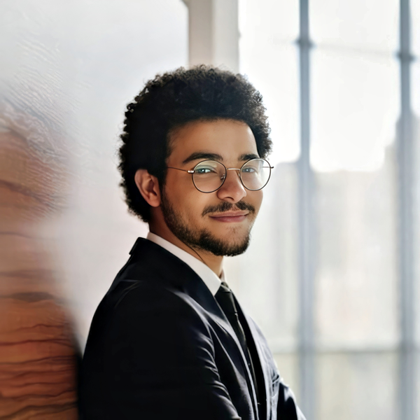 Lawyer headshot example: Young professional man, real photo enhanced by AI