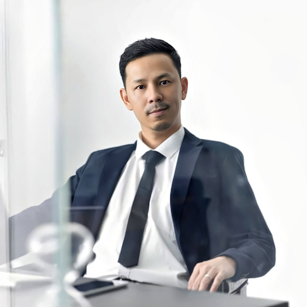 Lawyer headshot example: Asian man, real photo enhanced by AI