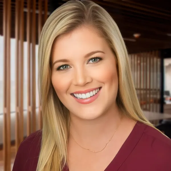 Corporate headshot example #16, real photo enhanced by AI