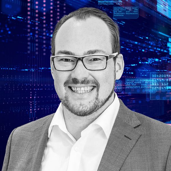 Corporate headshot example, real photo enhanced by AI