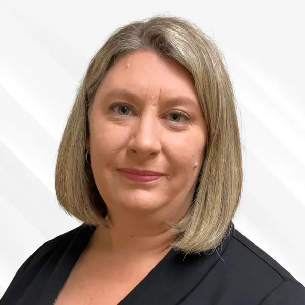 Corporate headshot example, real photo enhanced by AI