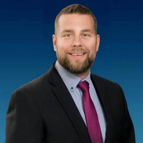 LinkedIn headshot example #10, real photo enhanced by AI