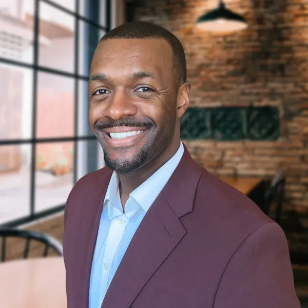Lawyer headshot example: placement mockup, real photo enhanced by AI