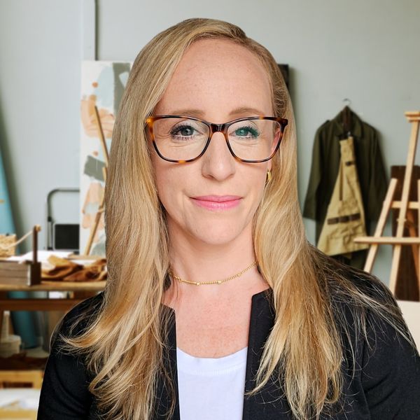 Corporate headshot example, real photo enhanced by AI