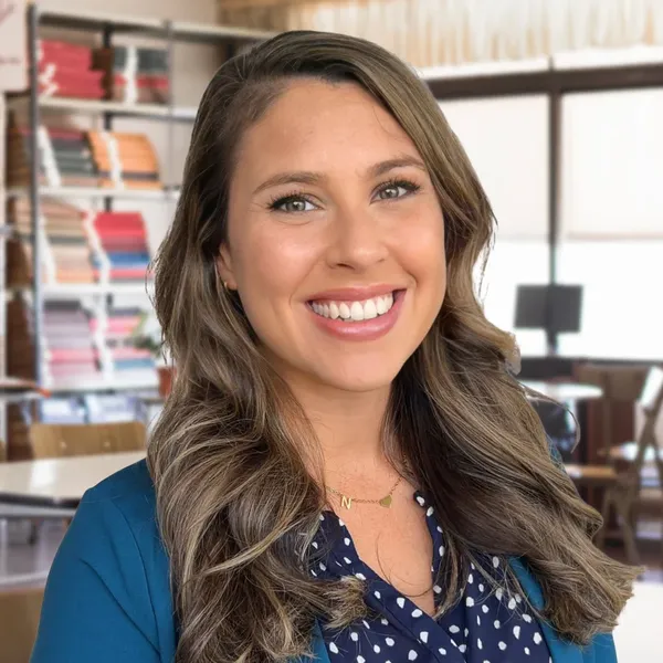 Corporate headshot example, real photo enhanced by AI