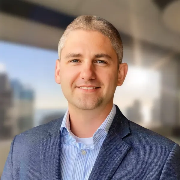 Corporate headshot example #3, real photo enhanced by AI