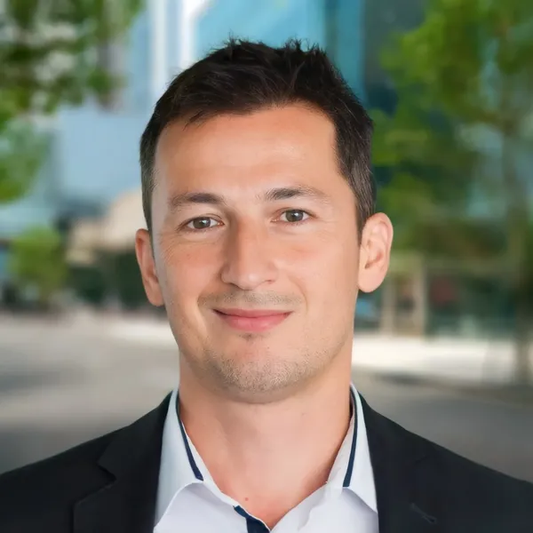 Corporate headshot example #6, real photo enhanced by AI
