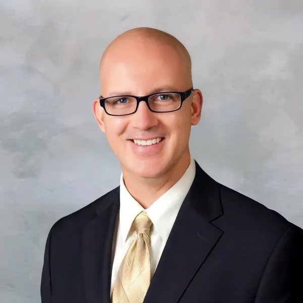 LinkedIn headshot example #1, real photo enhanced by AI
