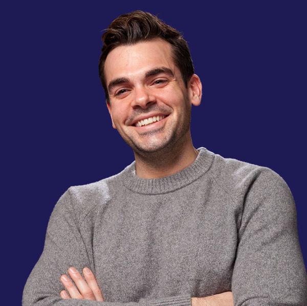 Corporate headshot example, real photo enhanced by AI