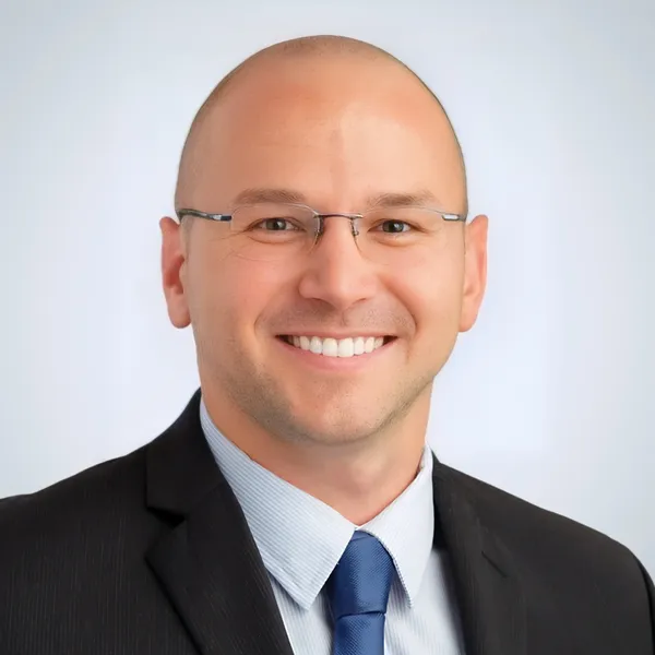 Corporate headshot example #17, real photo enhanced by AI