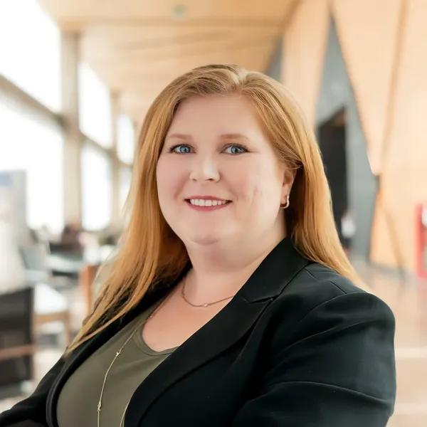 Corporate headshot example #14, real photo enhanced by AI