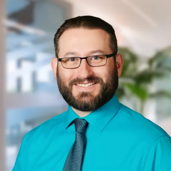 Medical headshot example #7, real photo enhanced by AI