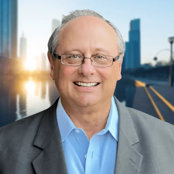 Corporate headshot example: placement mockup, real photo enhanced by AI
