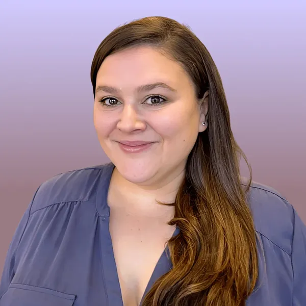 Corporate headshot example, real photo enhanced by AI