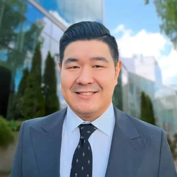 Corporate headshot example #5, real photo enhanced by AI