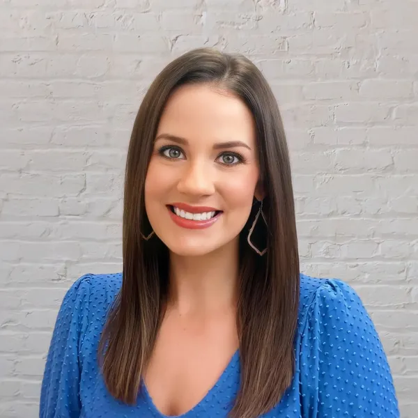 Corporate headshot example #18, real photo enhanced by AI
