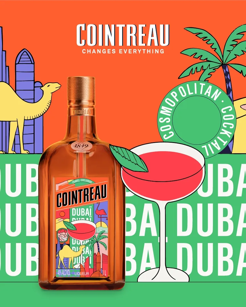 Cointreau bottle alongside a cocktail glass, set against Dubai-inspired illustrations such as a camel and modern skyline, with “Dubai” text in the background