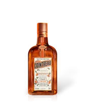 Cointreau L’Unique orange liqueur bottle, amber glass with copper cap and white label, 750 ml product shot on white background.
