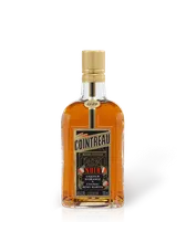 Cointreau Noir orange liqueur bottle, amber glass with golden cap and white label, 700 ml product shot on white background.