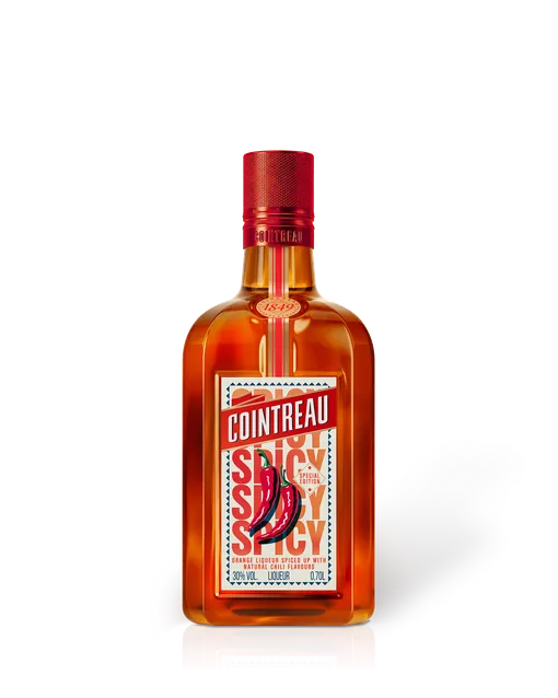 A bottle of Cointreau Spicy on a white background
