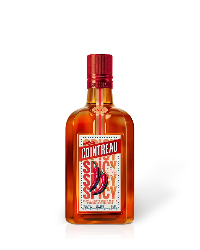 A bottle of Cointreau Spicy on a white background