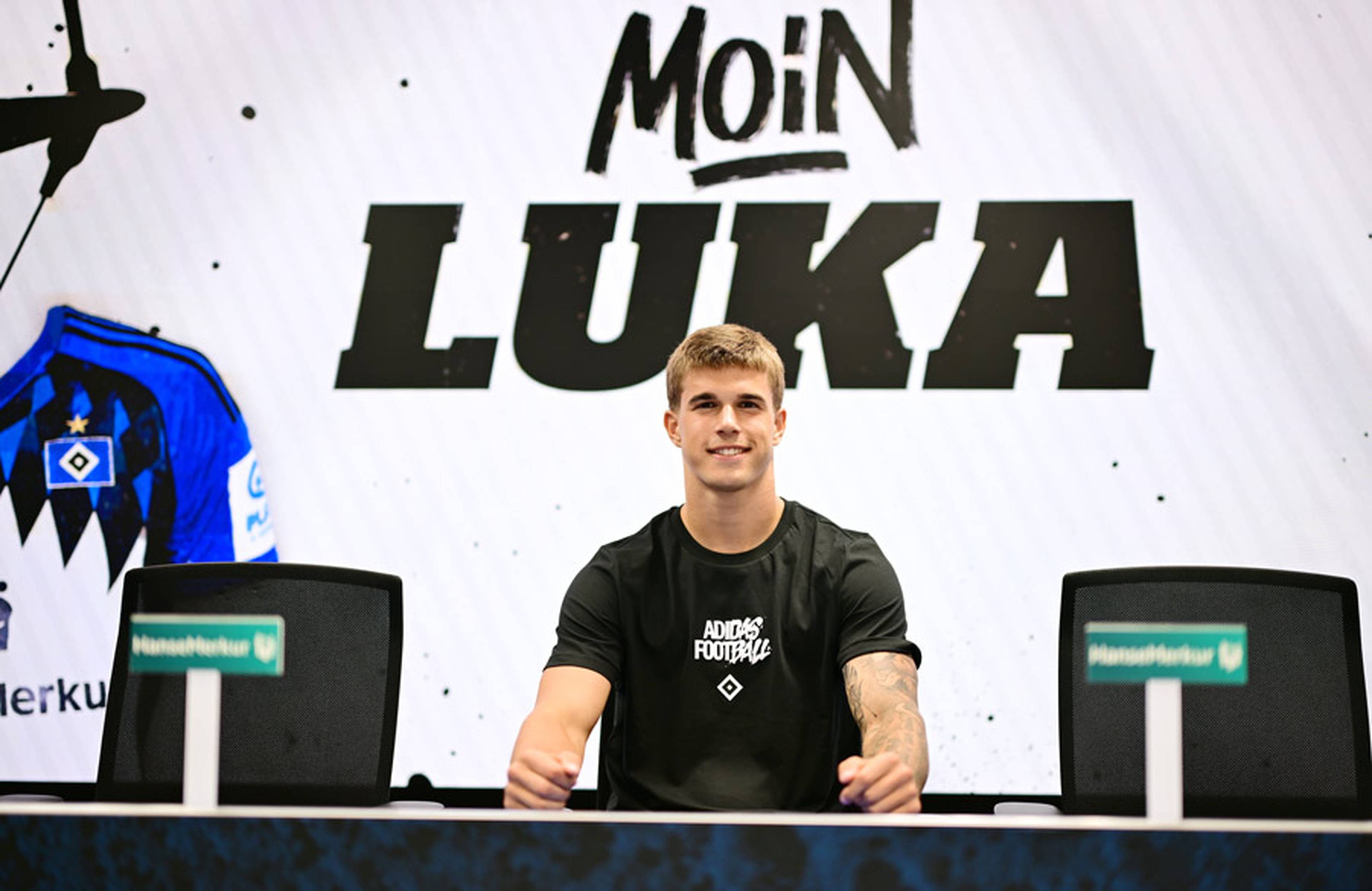 Luka Vuskovic sits at the press conference podium