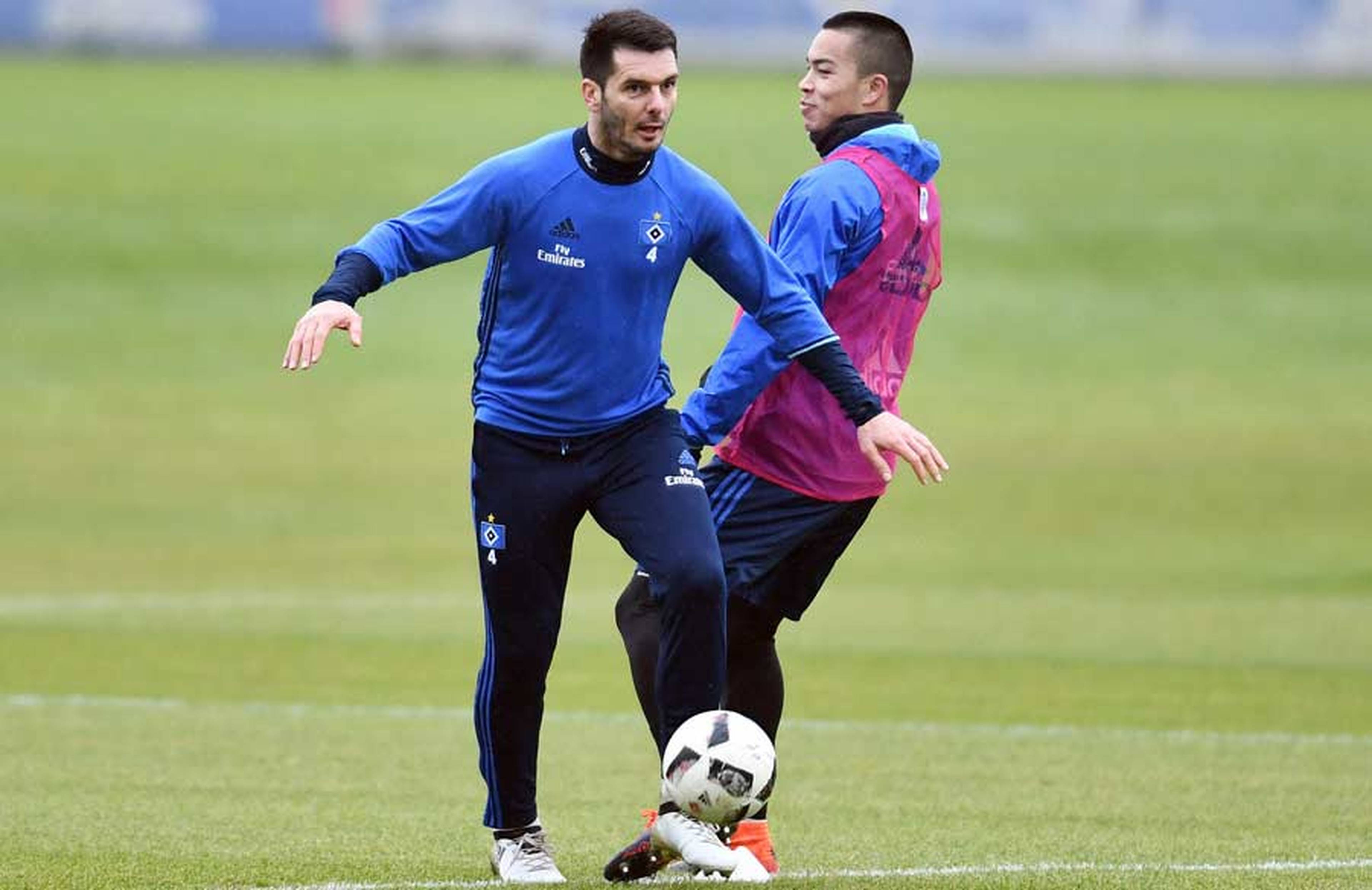 Emir Spahic battling Bobby Wood