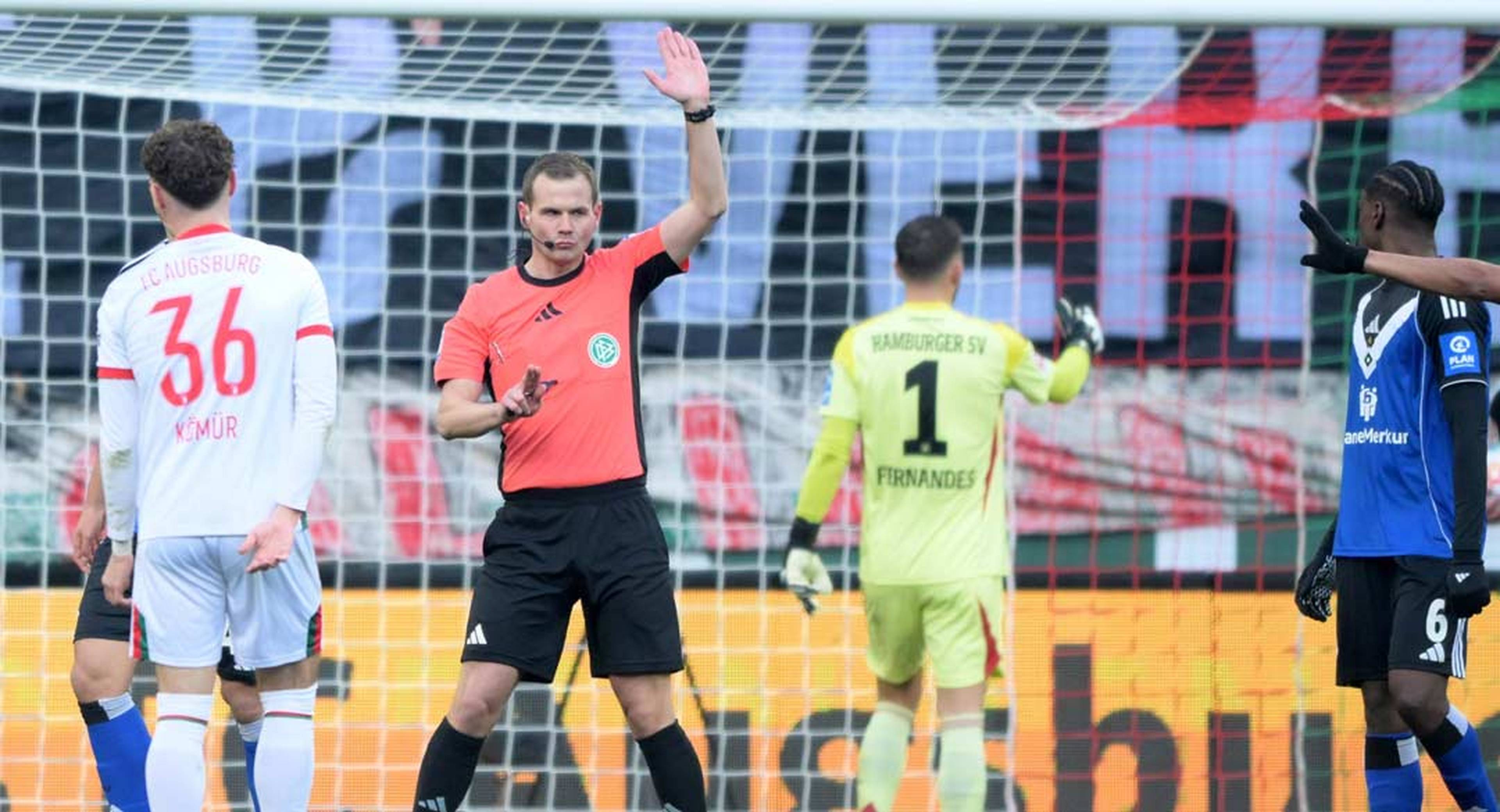 Caption: Referee Braun signals offside to rule out Augsburg’s early goal