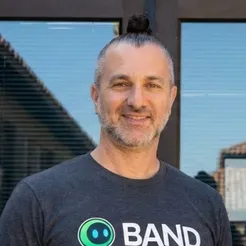 Arick Goomanovsky, Co-Founder & CEO, in BAND t-shirt