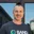 Arick Goomanovsky, Co-Founder & CEO, in Band t-shirt