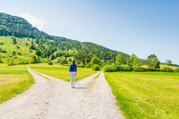 A Choice Of Two Ways. Woman At A Crossroads.