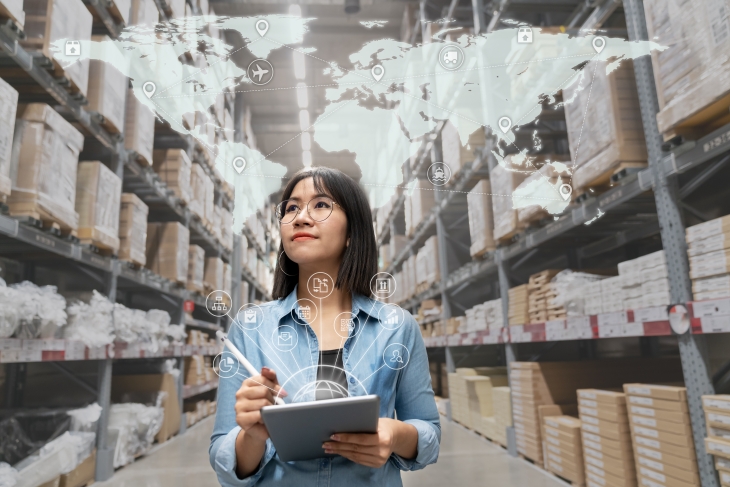 Looking At Inventory In Warehouse Using Smart Tablet In Management Technology, Interconnected Industry, Asian Small Business Sme Concept.