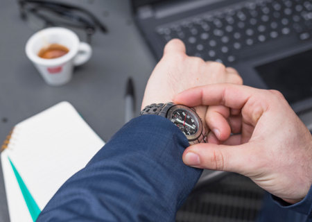 Real time financial reporting, checking watch to indicate