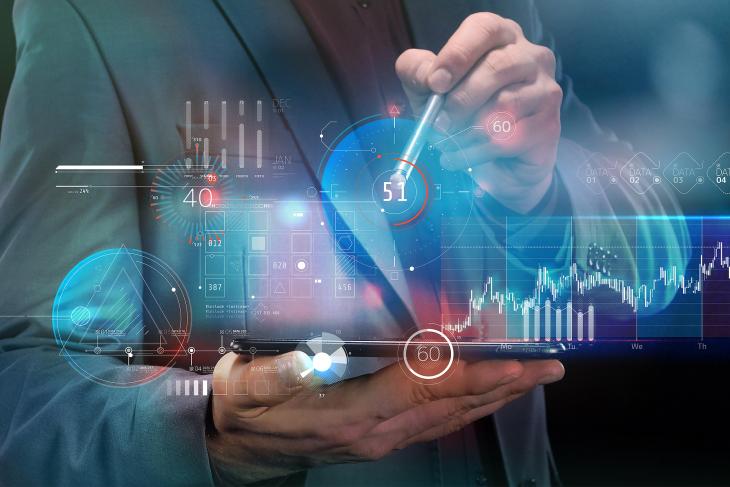 Businessman Works With Stock Infographics In The Virtual Panel O