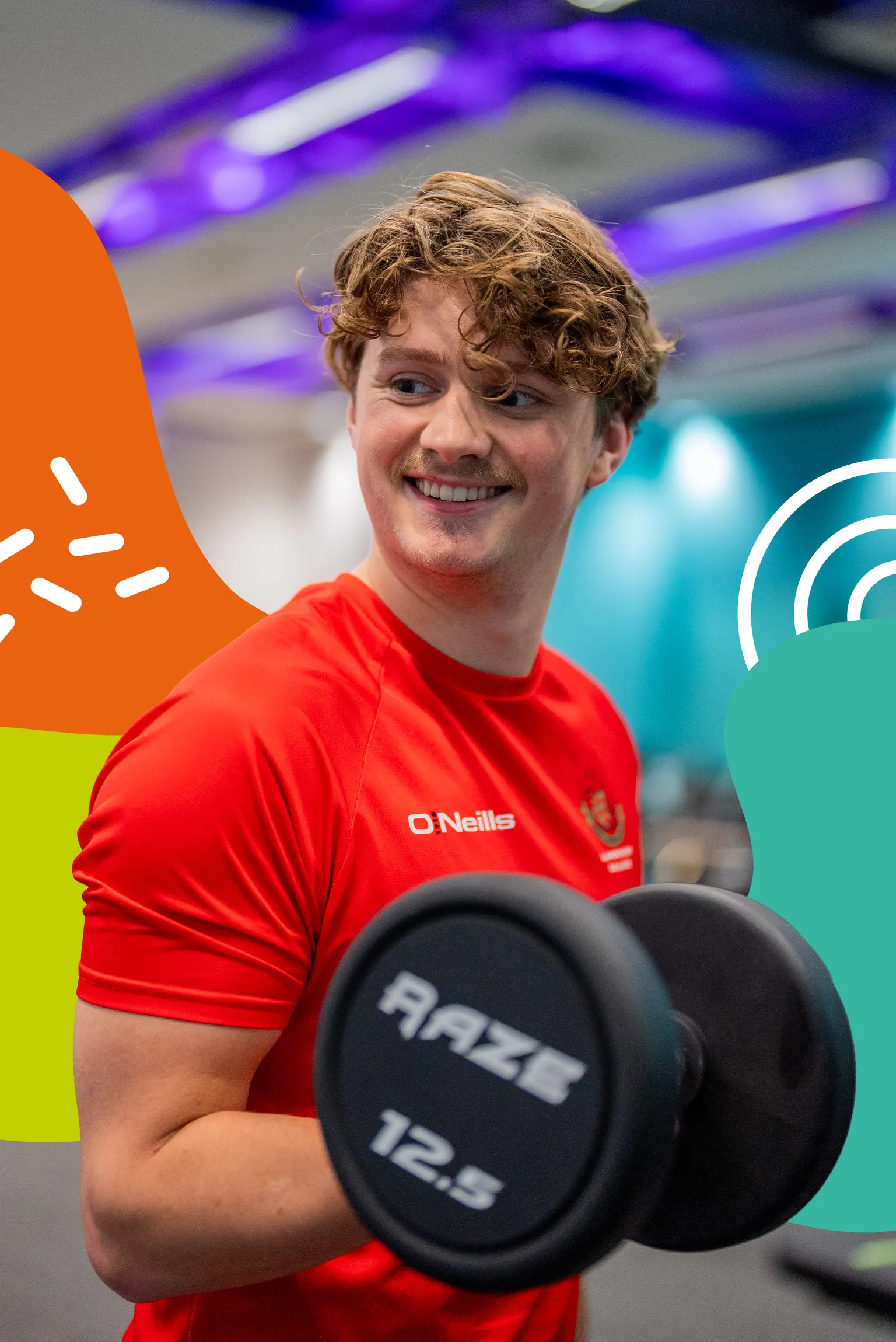 Smiling person in a red shirt lifting a 12.5 kg dumbbell, with colourful abstract shapes in the background.