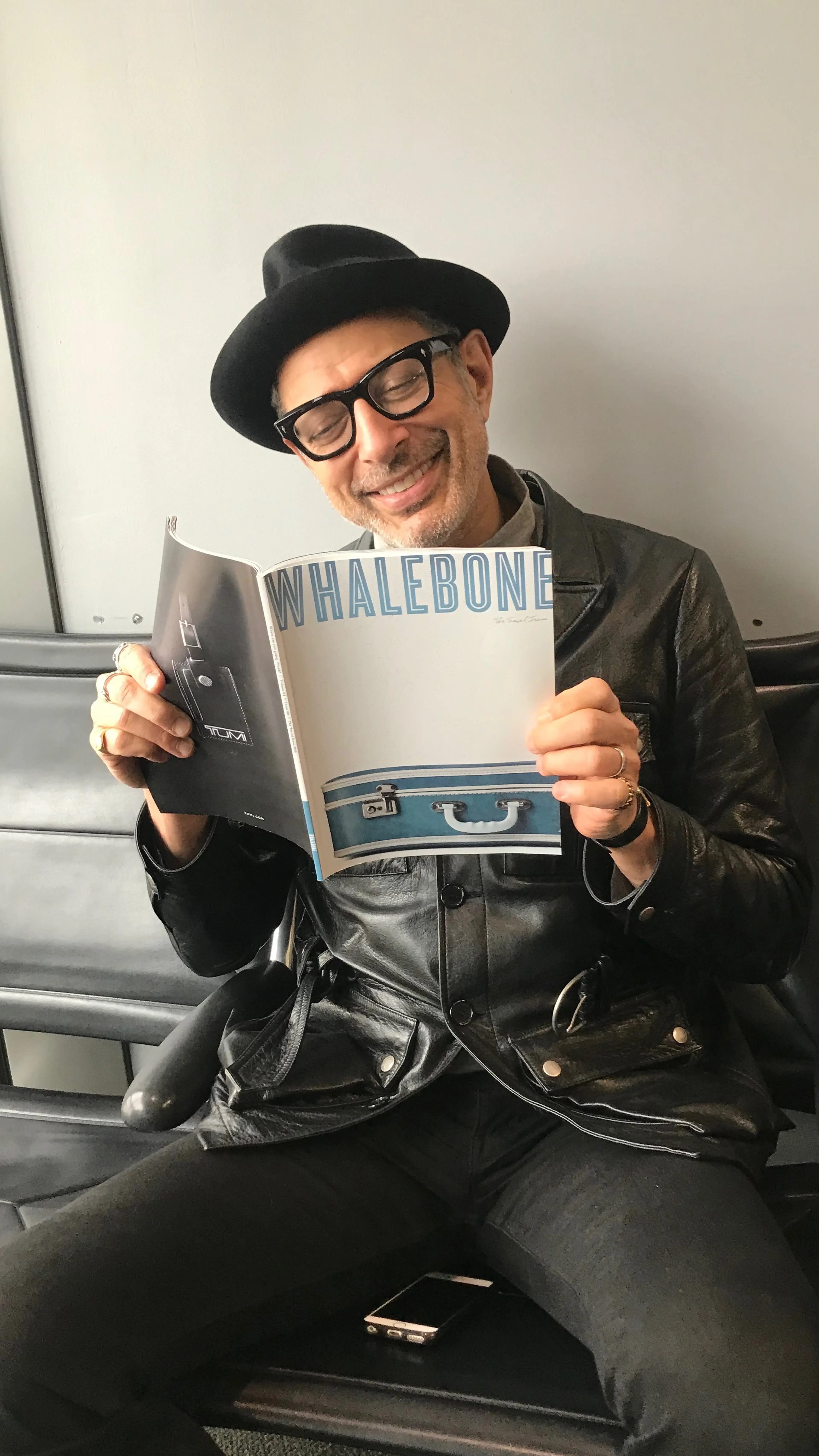 Jeff Goldbloom holding a Whalebone Magazine
