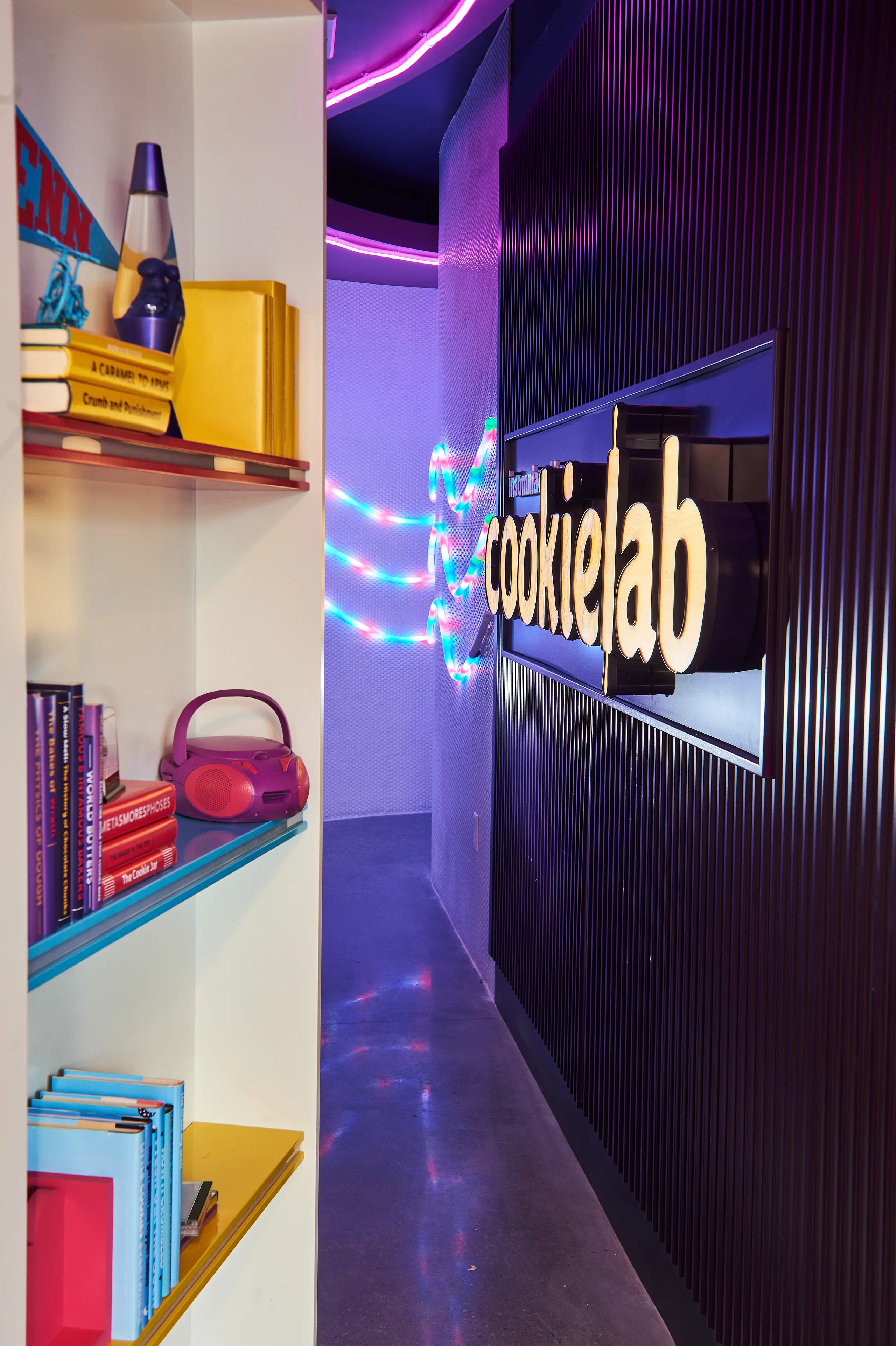 Cookie Lab secret bookshelf entrance opening.
