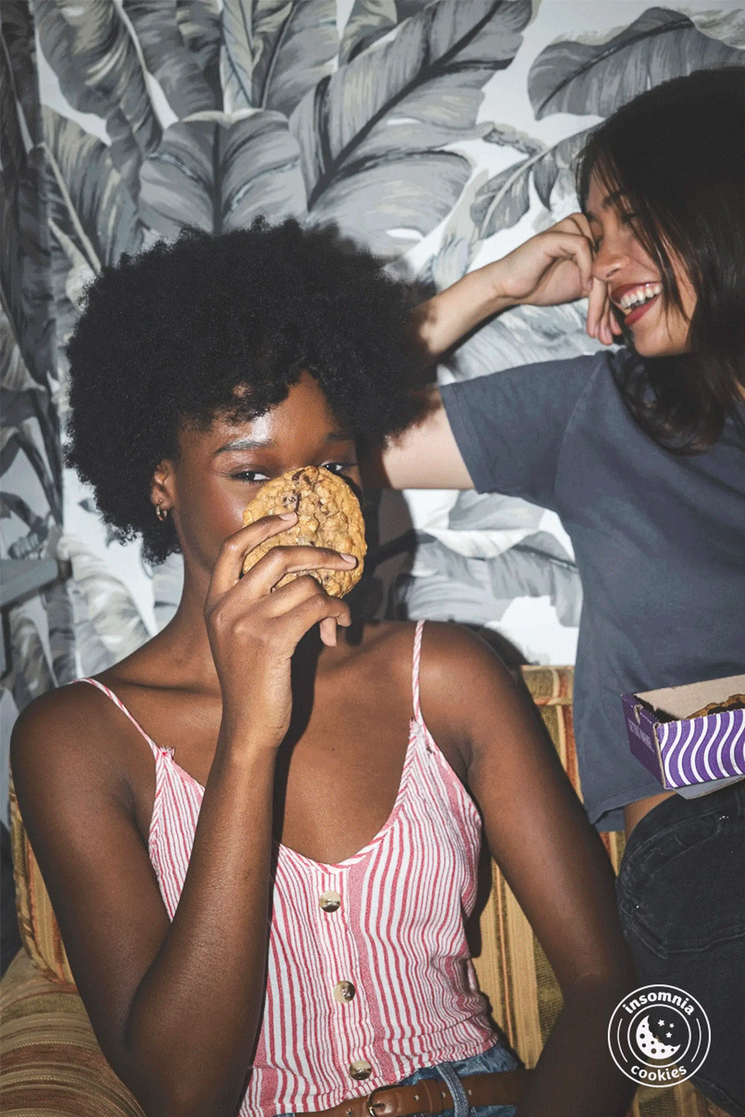 Girl holding an insomnia cookie.
