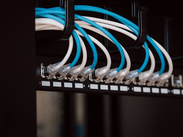 Neatly dressed patch leads in a data rack