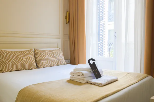 Bed Detail and Balcony View