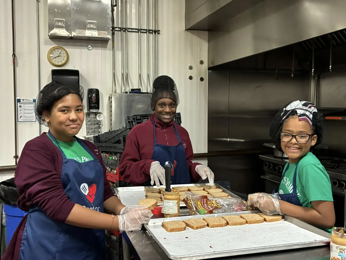 Volunteers preparing meals in the Caring for Friends commercial kitchen