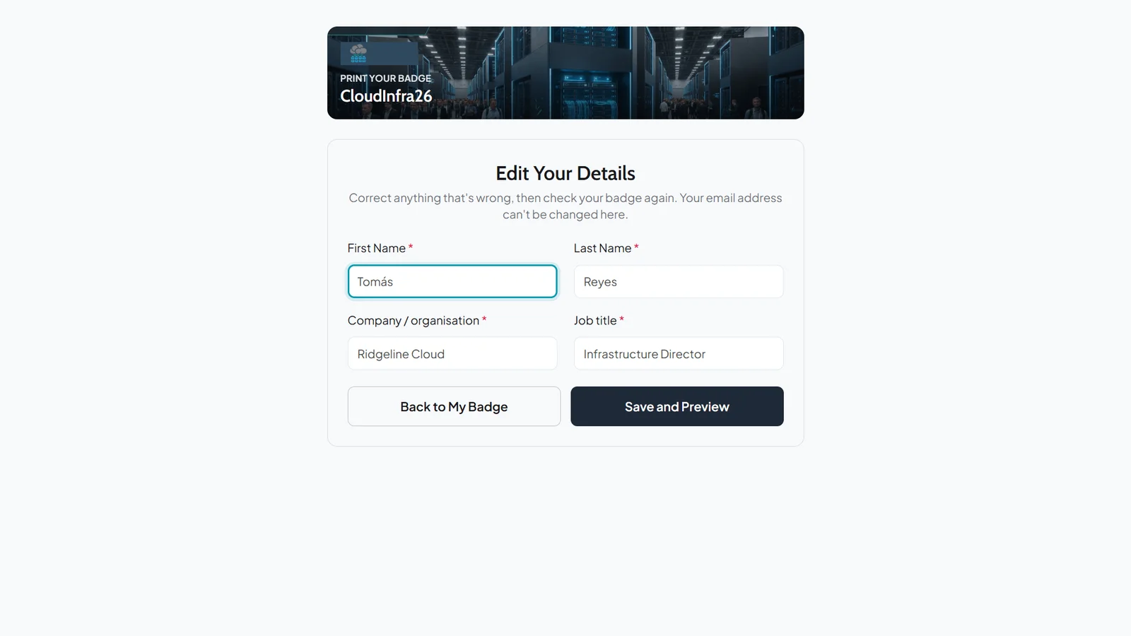 Badge kiosk Edit Your Details form with the first name being corrected to Tomás, plus last name, company and job title, and a Save and Preview button
