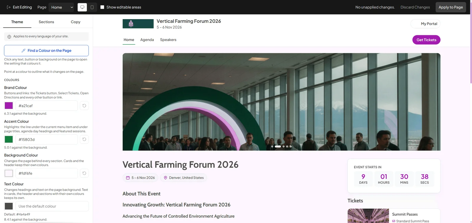 Website editor open on an event site: theme panel with brand, accent, background and text colours and their contrast ratios, a desktop and phone preview switch, Show editable areas, and Discard Changes and Apply to Page beside the live page