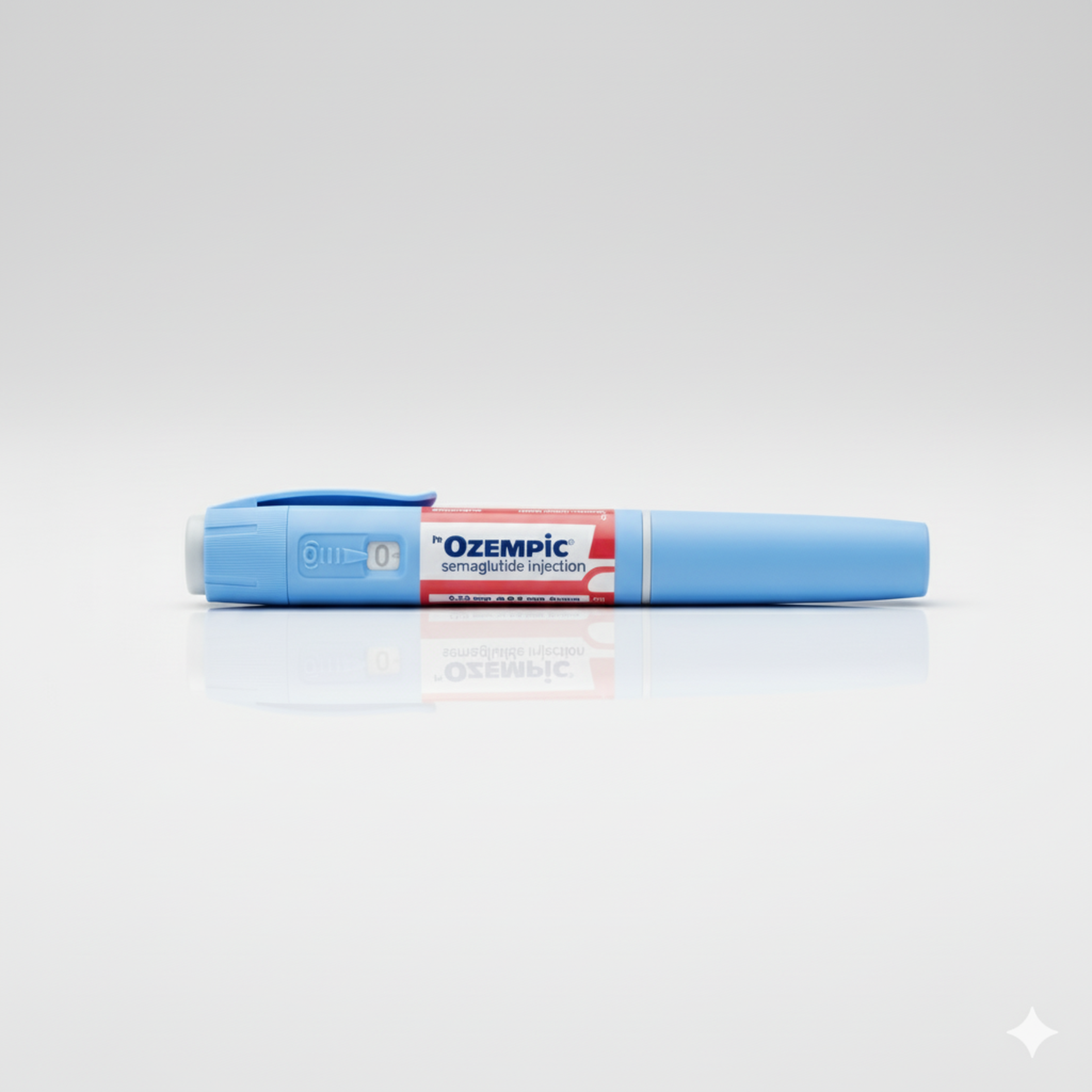 Blauwe Ozempic-injectiepen met rood etiket ligt op een lichtgrijze ondergrond